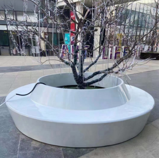 玻璃钢户外树池坐凳是指采用玻纤和树脂为材质制作的个性异形种植景观