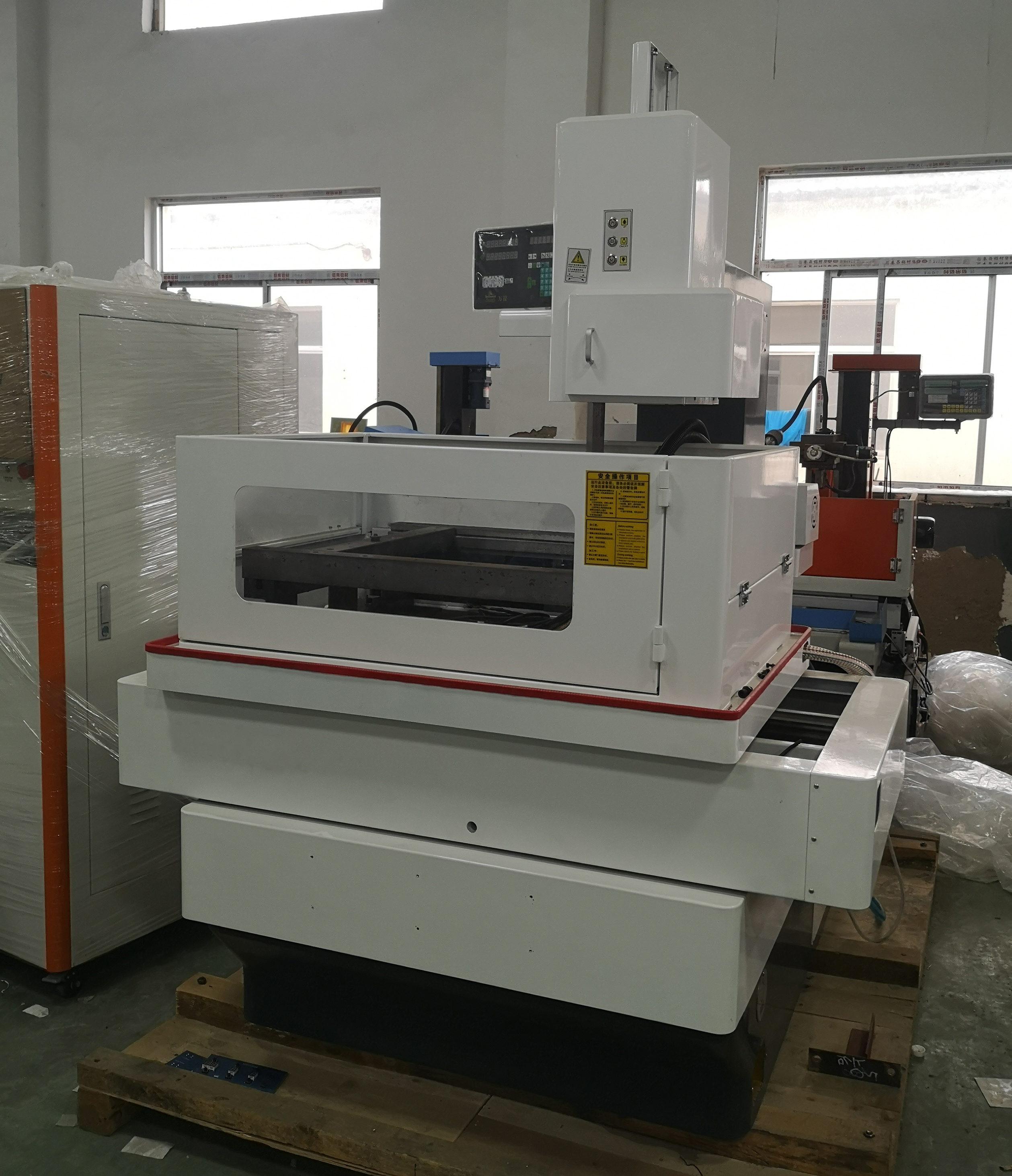 伺服中走丝机床脉冲控制的区别