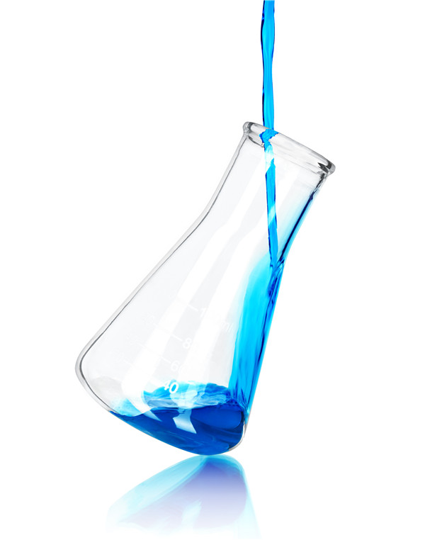Canva - in laboratory flask pours blue reagent.jpg