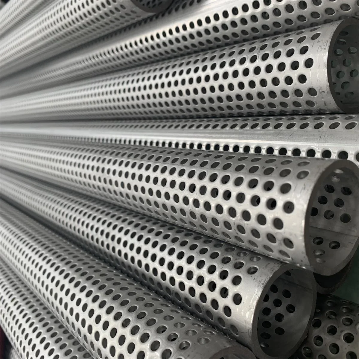 longitudinal welded perforated tubes